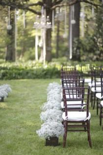 wedding photo - Boxed Baby's Breath Lining The Aisle 
