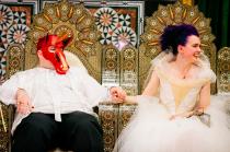 wedding photo - Bow at the throne of a rainbow-colored masquerade wedding