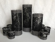 wedding photo -  black lace covered glass vases and votive candles with rhinestone