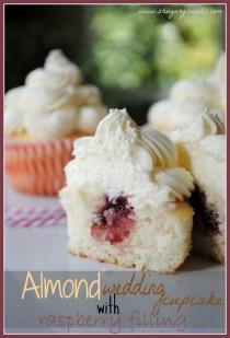 wedding photo - Almond Wedding Cake Cupcakes With Raspberry Filling