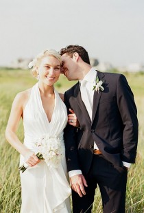 wedding photo - Sleek Wedding Updo - A Sleek Updo For A Seaside Wedding