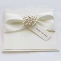 wedding photo - Satin Pearl Wedding Invitations With Luxury Satin Ribbons And A Crystal Cluster Embellishment