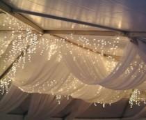 wedding photo - Winter Wedding Decor - Sheer White Draped Fabric And Icicle Lights