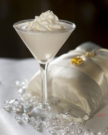 wedding photo - Wedding Cake Martini - 1.5 Oz Vanilla Vodka, 1/2 Oz Malibu® Coconut Rum, 1.5 Oz Pineapple Juice, One Splash Grenadine Sy...