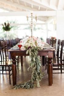 wedding photo - Wooden Tables With Garland Centerpiece