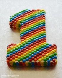 wedding photo - Rainbow M&M's First Birthday Cake Tutorial
