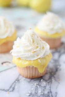 wedding photo - Coconut Cupcakes With Lemon Curd, Vanilla Whipped Cream And Toasted Coconut