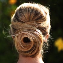 wedding photo - Upgrade To A Rose Bun For Your Holiday Parties!
