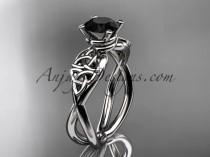 wedding photo -  platinum celtic trinity knot engagement ring, wedding ring with a Black Diamond center stone CT770