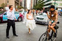 wedding photo - Couple Takes NSFW Wedding Pics In The Midst Of A Naked Bike Ride