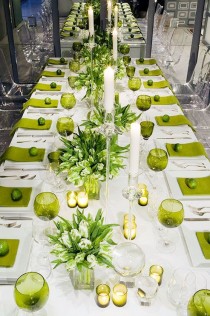 wedding photo - Lime Green Linens And Glassware Punctuate A Crisp White Tabletop Lined With Green And White Blooms.