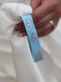 wedding photo - Love This Ribbon Inside The Dress And The Date Embroidered On That!