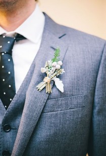 wedding photo - A Modern Boutonniere With Arrows & Berries