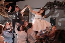 wedding photo - Hang on tight for dinosaur skellies, kitteh shoes, and a first dance under a T-Rex