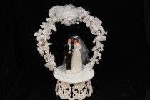 wedding photo - Vintage Inspired Bride and Groom with White Flower Arch Cake Topper
