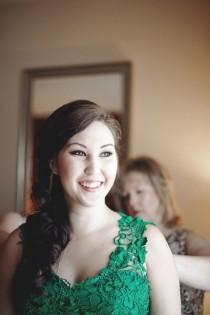 wedding photo - A daddy/daughter cake smooshing and emerald green dress at this Ohio wedding