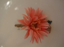 wedding photo - Boutonniere in coral gerber daisy