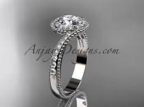 wedding photo -  platinum halo diamond engagement ring with a "Forever One" Moissanite center stone ADLR379