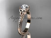 wedding photo -  14kt rose gold diamond celtic trinity knot wedding ring, engagement ring with a "Forever One" Moissanite center stone CT7391