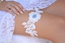wedding photo - White Lace Wedding Garter With Handknitted Shiny Blue Glass Pearls - Handmade Wedding Accessories