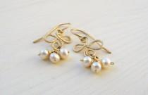 wedding photo - Pearl dangle earrings. Bridal jewelry. Gold bridal earrings. Wedding pearl earrings. Bridal gift. Gold dangle earrings.