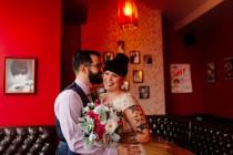 wedding photo - Tiny, gold, and floral: this "cheez-y" weekday wedding in a diner wins