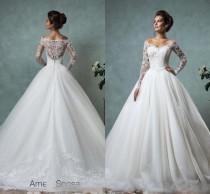 wedding photo - Amelia Sposa 2016 Lace Tulle Wedding Dresses Vintage Spring Fall Off Shoulder Long Sleeve Bridal Gowns Plus Size Arabic Wedding Gowns AS2005 Online with $148.64/Piece on Hjklp88's Store 