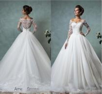 wedding photo - Amelia Sposa Long Sleeves Wedding Dresses Lace Bridal Gowns Plus Size Vintage Cheap V-Neck Arabic Sheer Ball Gown Wedding Dresses Chapel Online with $154.87/Piece on Hjklp88's Store 