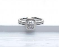 wedding photo - Cushion cut diamond platinum tapered band solitaire