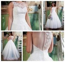 wedding photo -  Stunning Illusion Neckline & Back A-line Lace Over Wedding Dress
