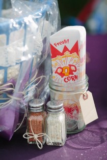 wedding photo - Set out popcorn and flavor shakers for a fun (and cheap!) cocktail hour snack