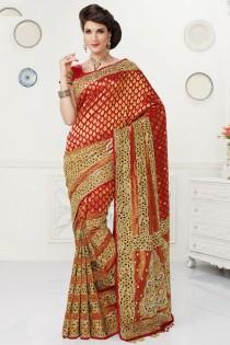 wedding photo -  Red pure silk glamorous zari weaved saree with gold border