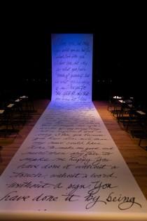 wedding photo - This Roy Croft aisle runner brings poetry right to our feet