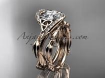 wedding photo -  14kt rose gold celtic trinity knot engagement set, wedding ring with "Forever One" Moissanite center stone CT764