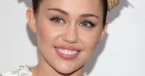 wedding photo - A Newly Blond Miley Cyrus Steps Out Wearing Her Engagement Ring