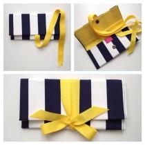 wedding photo - Navy Clutch in canopy stripe with yellow bow. The ALEXIS Clutch.