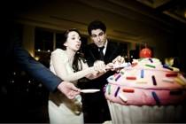 wedding photo - Funny Cake Cutting Photo By Viera Photographics