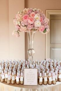 wedding photo - Mini Champagne Bottles With Straws And Ribbon....