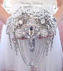 wedding photo - BROOCH BOUQUET, silver jeweled in white color with cascading of wedding jewelery for bride.