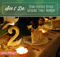 wedding photo - How To Make A Sand-covered Beach Wedding Table Number