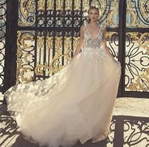 wedding photo - Skirts With Style: 7 Ball Gowns For Brides