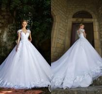 wedding photo -  New Style Wedding Dresses 2016 Lace Appliques V Neck Cap Sleeves Princess Beach Bridal Dresses Ball Gowns Count Train Vestido De Noiva Online with $124.38/Piece on 