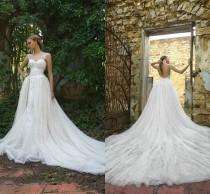 wedding photo -  New Arrival Lace Backless Wedding Dresses Applique Tulle Spaghetti Straps Sleeveless 2016 Bridal Ball Gowns Vestido De Noiva Chapel Train Online with $109.3/Piece on Hjklp88's Store 