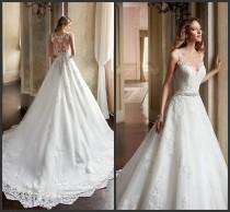 wedding photo -  Gorgeous 2016 A Line Wedding Dresses Sheer Scoop Neckline Beaded Appliques Lace Church Ivory Sheer Back Bridal Ball Gowns Chapel Train Online with $111.56/Piece on 