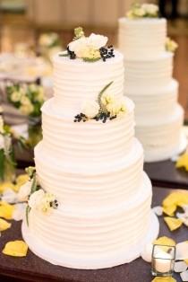wedding photo - Four-Tier White Buttercream Wedding Cake