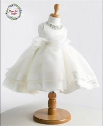 wedding photo - Beautiful White or Ivory Satin Girls Gown with a jewel neckline and a Big Bow