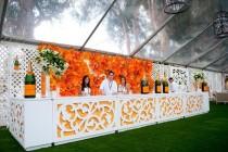 wedding photo - BrownHot Events Partnered With Mille Fiori Floral Design To Create An 8- By 20-foot Paper Flower Backdrop For The V.I.P. Tent Bar At The Third Annual Veuve Clicquot Polo Classic In Los Angeles In October.