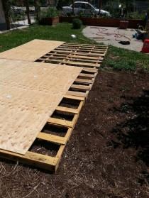 wedding photo - Creating A Dance Floor From Recycled Pallets