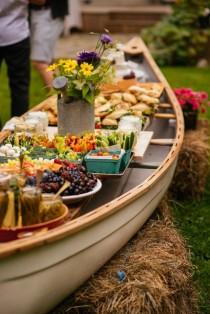 wedding photo - How To Set Up An Outdoor Buffet In A Canoe