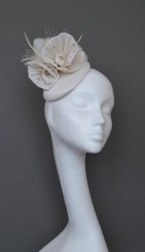 wedding photo - Small ivory silk hat.  Ivory silk fascinator. Ivory wedding hat.  Ivory feather hat. Ivory hat with Swarovski  crystal beads.  Handmade.